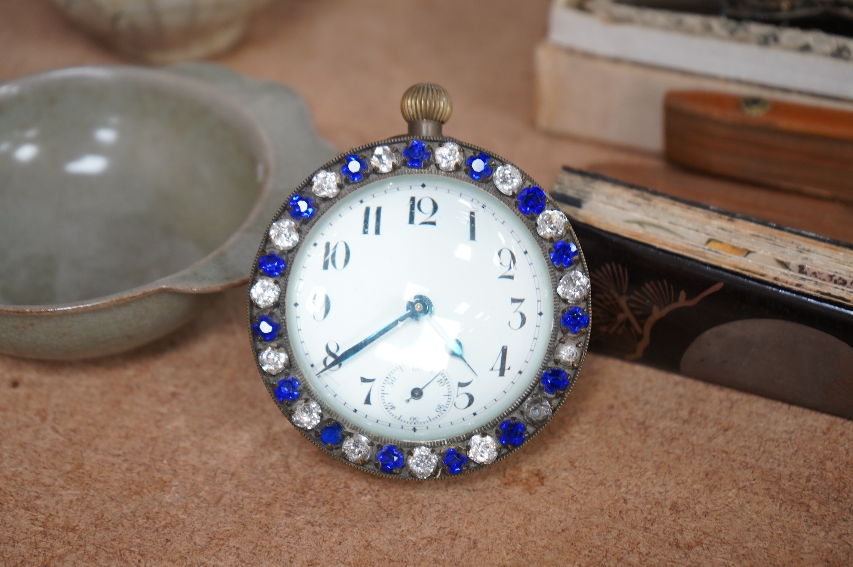 A French paste-mounted globular desk timepiece, 7cm in diameter